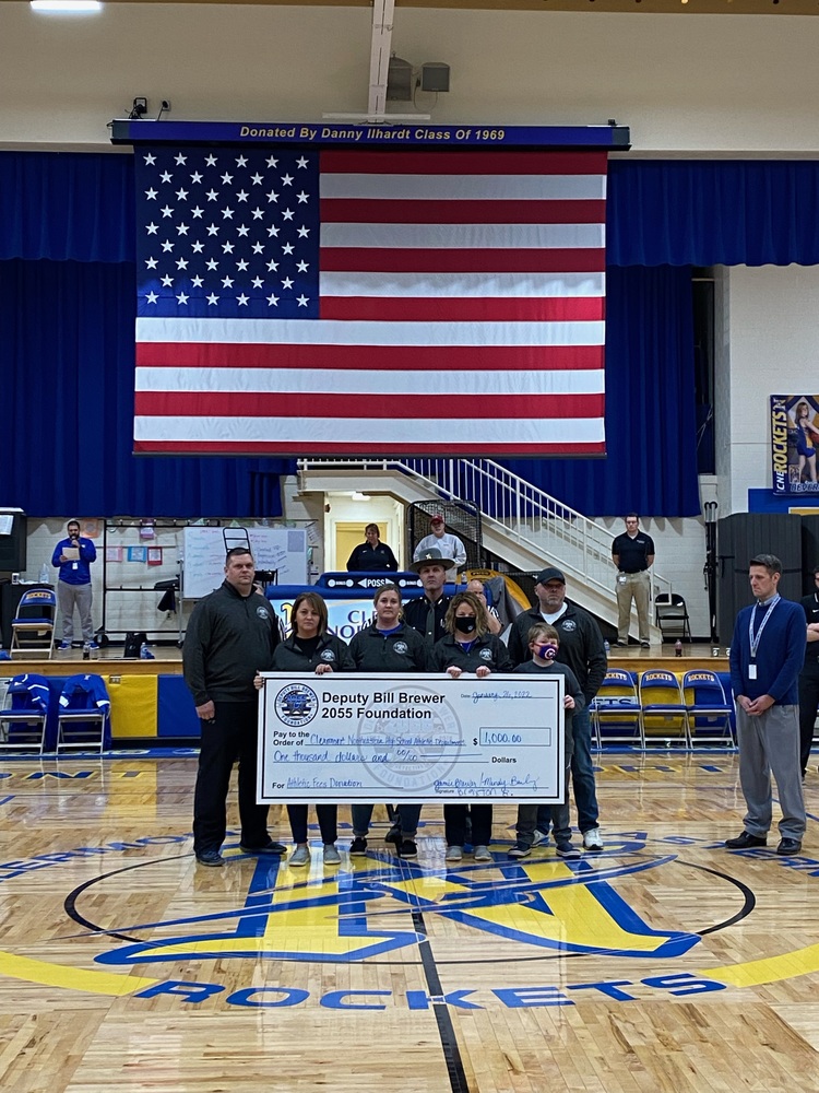 Representatives of the Deputy Bill Brewer 2055 Foundation present a check for $1,000 to Clermont Northeastern High School Jan. 26. (Photo courtesy Clermont Northeastern School District.)