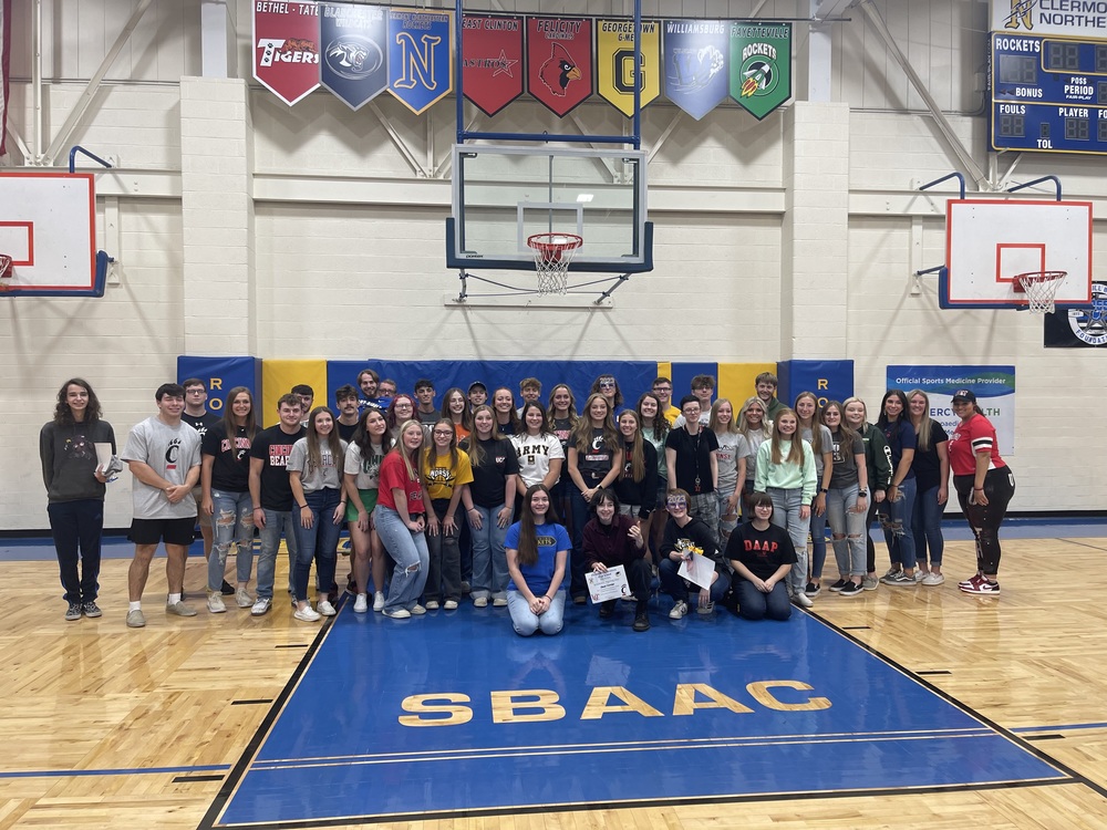 The 45 members of Clermont Northeastern High School’s graduating class who signed academic letters-of-intent May 16 pose for a group photo in the gym. (Photo by Dick Maloney.)