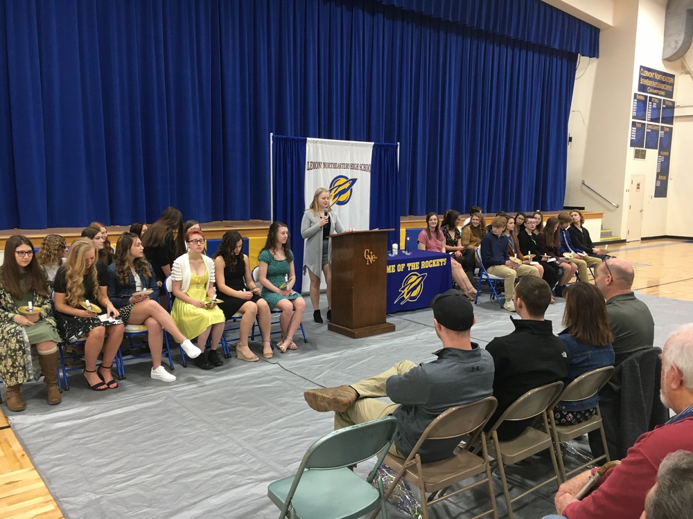 lermont Northeastern National Honor Society President Gracie Minton speaks to the crowd at the March 12 induction ceremony. (Photo by Dick Maloney.)
