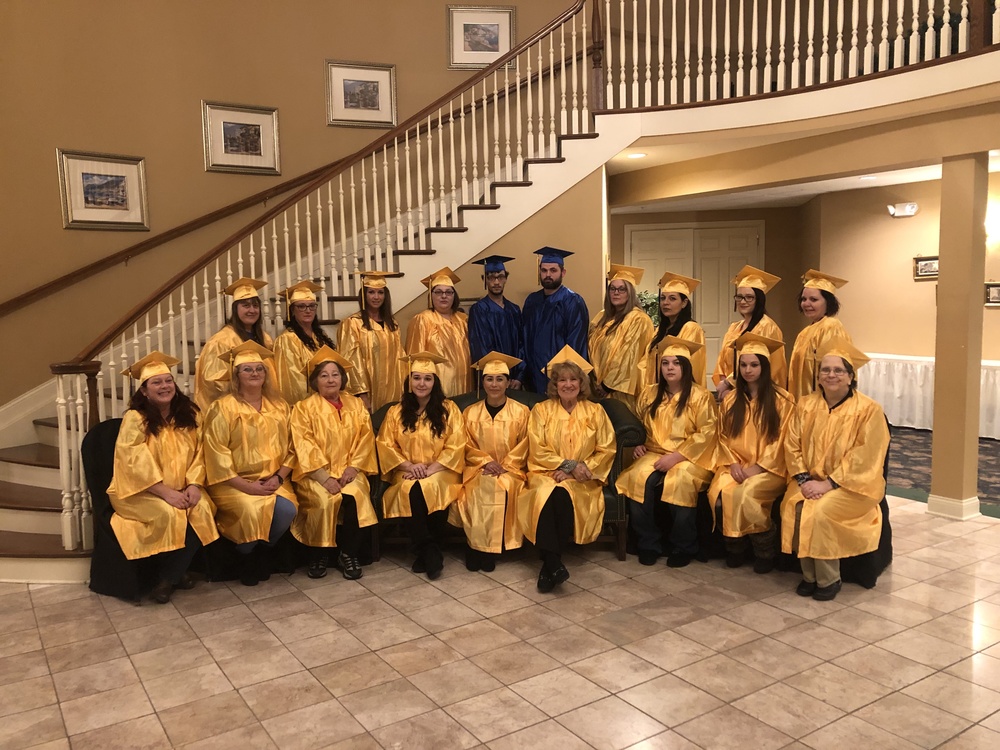 Members of the second Clermont Northeastern Adult 22-Plus graduating class pose for a photo in the lobby of Norlyn Manor in Batavia before commencement ceremonies Jan. 22.