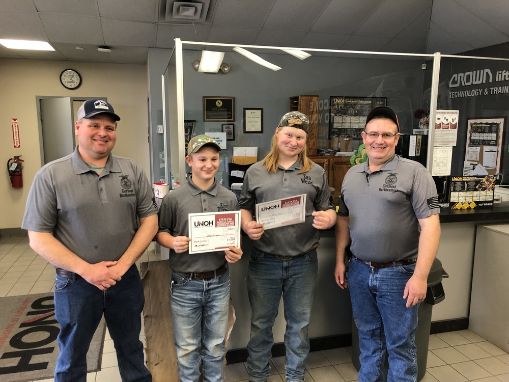 PHOTO CAPTION Clermont Northeastern High School sophomores Alex Busam and Zan Weiss, with coaches Tom Borchers and David Lewis, at the Ohio Agricultural Power Diagnostics event March 4 at University of Northwestern Ohio in Lima. (Photo courtesy Emily Weiss.)